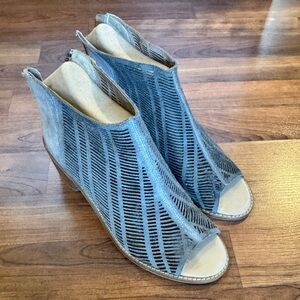 Very Volatile Laser-Cut Peep-Toe Booties